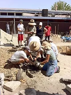 EARTHIFIED: Students staff and parents at Flamson Middle School in Paso Robles work on a 4,000 square-foot garden full of native plants. The garden was just on of the many projects involving local nonprofit One Cool Earth and local schools. - PHOTO COURTESY OF ONE COOL EARTH