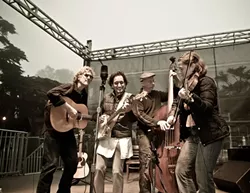 STOMP AND STRUM : The Evie Ladin Band plays old time music at its best, with Ladin’s banjo playing and stepdancing, on Jan. 22 at the Red Barn. - PHOTO COURTESY OF EVIE LADIN