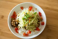 LO AND BEHOLD: The popular Lo Fu is named after KunFusion chef and owner Lori Nunes, who crafted the tasty, health-conscious mix of hearty tempeh, - yellow onion, aromatic spices, crisp broccoli slaw, guacamole hummus, and juicy diced cherry tomatoes. - PHOTO BY TOM FALCONER