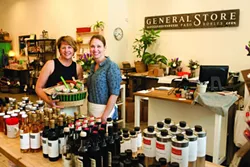 GENERALLY COOL : Downtown Paso Robles now has a store full of goodies for awesome picnic baskets (like the one Joeli Yaguda is holding on the left next to Jillian Waters) or for general household usage. - PHOTO BY STEVE E. MILLER