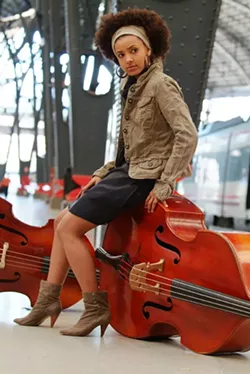 ACE OF BASS : The gorgeous and talented composer, bassist, and vocalist Esperanza Spalding plays Cal Poly’s Spanos Theatre on Oct. 8, the first of three Cal Poly Arts-sponsored jazz concerts this weekend. - PHOTO BY JOHANN SAUTY