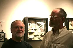 GLITTERATI: Local artist Mark Bryan and New Times political cartoonist Russell Hodin were a couple of the many notable art lovers in attendance. - PHOTO BY GLEN STARKEY