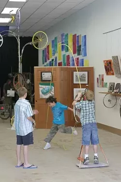 KIDS AT PLAY : There are several interactive contraptions for kids to play with, making this a very hands-on art gallery. - PHOTO BY GLEN STARKEY