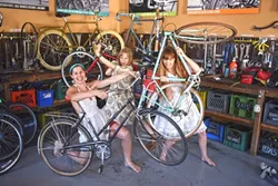 READY TO RIDE: Some of the designers from the SLO Bike Coalition’s fashion show model their pieces with their wheeled inspirations. - PHOTO COURTESY OF SLO BIKE COALITION