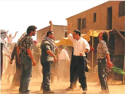 SNAP-OFF: Jews and Palestinians engage in an expertly choreographed snapping fight in Ari Sandel’s satirical short 'West Bank Story.' - PHOTO COURTESY OF WEST BANK STORY