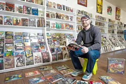 THE DOCTOR IS IN : Reid Cain is convinced that he can convert non-comic book fans through his new shop in downtown SLO. - PHOTO BY STEVE E. MILLER