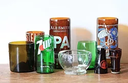 CHOP, CHOP: SLO-based Chop Top Bottle Co. is crafting the coolest cups, candle holders, lamps, guitar slides, and more from upcycled glass bottles. Not only are these gifts 100 percent unique, but you can rest assured they leave behind a miniscule carbon footprint, too. - PHOTO COURTESY OF CHOP TOP BOTTLE CO.