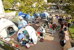 SHANTY OCCUPATION : After a week of protest, the Occupy SLO movement turned into a transient camp; the steering committee withdrew its support to plan for a more cohesive effort. - PHOTO BY STEVE E. MILLER