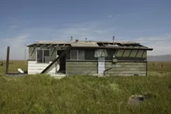 FORGOTTEN : Dozens of abandoned structures litter California Valley—dubbed by county officials as the “Field of Broken Dreams”—decades after a scam that took advantage of eager new landowners. - PHOTO BY STEVE E. MILLER