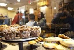 GET ’EM WHILE THEY’RE HOT : Baked goods at the newly opened Panera Bakery and Café are made fresh each night. - PHOTO BY STEVE E. MILLER