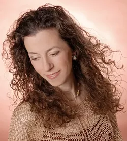 CHRISTMAS BELLE: Guest vocalist Christa Burch joins Celtic band Molly’s Revenge on Dec. 13 in St. Benedict's Episcopal Church. - PHOTO COURTESY OF CHRISTA BURCH