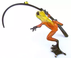 GET HIM WHILE HE’S HOT! : Hot Shot, pictured, is one of artist Tim Cotterill’s original frog designs, exclusively made for Cambria’s Artifacts Gallery. Proceeds from this golden beauty benefit Hospice of SLO County. - PHOTO BY CELESTE GOYER