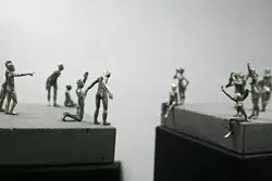 DON’T JUMP! : This sculptural diptych features gestural little people playing out a scene divided by a chasm. - PHOTOS BY GLEN STARKEY