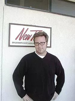 STILL FIT AND FREE! : A still young Glen Starkey stands outside New Times’ old Santa Rosa St. office, long before he became the broken man he is today. - NEW TIMES FILE PHOTO