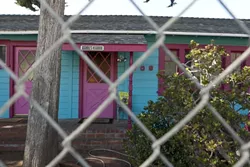 ASSHOLE’S NEIGHBOR : Proving the adage about fences, neighbors in Cayucos fought during 2011. - PHOTOS BY STEVE E. MILLER