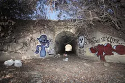 A CONCRETE GALLERY : Tunnels found along SLO’s railroad corridor provide graffiti artists a canvas. - PHOTO BY STEVE E. MILLER
