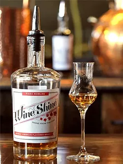 PROHIBITION NO MORE: As a stand-alone distillery, Wine Shine, has the freedom to explore making a wider variety of products, like this lemon hibiscus brandy, which would go great in a cosmo. - PHOTO BY DYLAN HONEA-BAUMANN