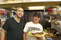 HERO OF THE GYROS : Samir Aburashed and Chef Antonio Ruiz show off their gyro sandwich. - PHOTO BY STEVE E. MILLER