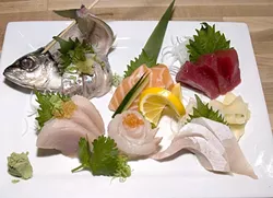 CHEF’S CHOICE: The omakase plate, literally meaning “I’ll leave it to you,” allows the sushi chef to choose the sashimi providing six types of raw fish. - PHOTO BY DAN HARDESTY