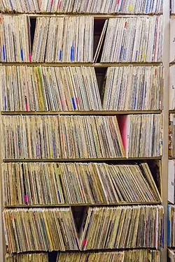 WAXING POETIC: After Cal Poly officials announced that they’ll be changing the way KCPR operates in order to make it more of a “learning laboratory,” many wonder what will become of the station, including the 2,000-plus records the station has in its library. “Does a journalism laboratory need a complete set of Black Flag CDs?” wonders long-time community DJ James Cushing. “What a learning laboratory needs with an extensive collection of alternative ’80s LPs is not clear.” - PHOTO BY KAORI FUNAHASHI