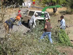 WORKING UP A SWEAT : Patterson volunteers every year to help clean Yerba Buena Creek and prevent it from flooding Santa Margarita during heavy winter storms. - PHOTO COURTESY OF HEIDI PETERSEN