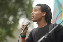 VOICING CONCERN : Peter Wade, Cal Poly’s chapter president of the Society of Black Engineers and Scientists, called for a town hall meeting with Cal Poly President Warren Baker. - PHOTO BY STEVE E. MILLER