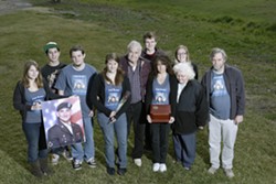 FAMILY AND FRIENDS :  U.S. Army Specialist John Fish lives in the memories of, from left to right, stepsister Amanda Edick, buddy Lance Wilkerson, stepbrother Brian Edick, sister Sarah Masters, grandfather Gene Griffin, friend Matt Ingerwerson, mother Cathy Fish (holding box), friend Ashley Sobczak, grandmother Evie Arritt, and stepbrother Tom Edick. - PHOTO BY STEVE E. MILLER