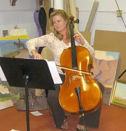 BACKGROUND MUSIC : Lynne Oliverius, a cellist with the SLO Chamber Orchestra, provided soothing melodies to put folks in the art-viewing mood. - PHOTO BY NICK POWELL