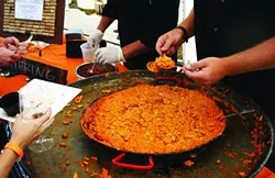 BRING ON THE HEAT: Crush Catering’s vegetarian friendly seven cheese mac and cheese took flavors to new heats—and heights—with a roasted tomatillo habanero salsa. More than 20 local chefs converged at the coastal Avila Golf Resort for an all-out mac and cheese throw down. - PHOTO BY REID CAIN