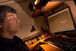 EARTHBOUND EXPLORER : David Martines discovered an anomaly on the red planet’s surface using Google Earth’s Mars Explorer. Experts attributed the finding to a cosmic ray, but Internet conspiracy theorists have other ideas. - PHOTO BY STEVE E. MILLER