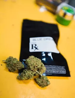 PRESCRIPTIVE RIGHTS: Gov. Jerry Brown signed into law the Medical Marijuana Regulation and Safety Act, which implements comprehensive regulations for the medical marijuana industry. While the law may clarify some legal gray areas, how the legal permitting and licensing of medical marijuana will play out in San Luis Obispo County is uncertain. - FILE PHOTO BY KAORI FUNAHASHI