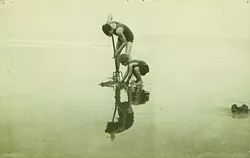 HAPPY AS A YOU-KNOW-WHAT : A young Jane Whiteman digs for clams in Oceano alongside her father, Luther Whiteman, author of The Face of the Clam. - PHOTO COURTESY OF THE SOUTH COUNTY HISTORICAL SOCIETY