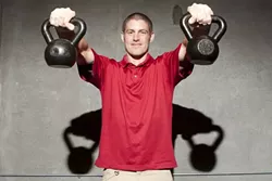 WAKE THE TIGER : Nathan Zimmerman will help get you fit and ripped at Sleeping Tiger Fitness at the rate of $20 for drop-in classes or $120 per month. - PHOTO BY STEVE E. MILLER