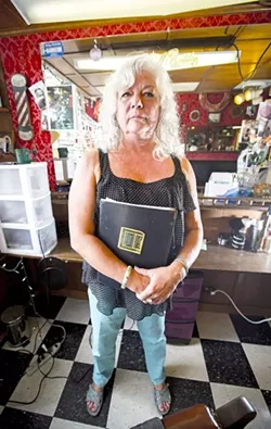 PERFECT STORM OF CRAP: For Diane Gillett, a slumping economy and dual knee surgeries led to a long sequence of battles with her creditors that ultimately resulted in a lawsuit brought against her. - PHOTO BY HENRY BRUINGTON