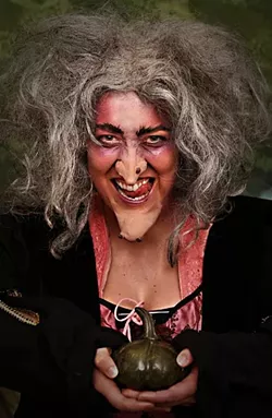 WITCHY WOMAN: Alison King (pictured) plays the Witch, who tells the Baker and his wife she will lift the curse she placed on them if they bring her a cow as white as milk, a cape as red as blood, hair as yellow as corn, and a slipper as pure as gold. - PHOTO COURTESY OF KELRIK PRODUCTIONS