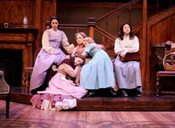 THE MARCH FAMILY: The four March sisters—Meg (Sarah Girard, upper left), Beth (Renee Wylder, lower left), Amy (Brittney Monroe, lap), and Jo, (Karin Hendricks, far right)—and their mother (Elizabeth Stuart, center), receive a letter from a faraway Mr. March in PCPA’s Little Women, the Broadway Musical. - PHOTO BY LUIS ESCOBAR, REFLECTIONS PHOTOGRAPHY STUDIO