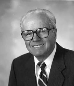 AGRICULTURAL PIONEER: Ernie Righetti, pictured here in a portrait taken when he was named Agriculturalist of the Year by the local farm bureau, died on Jan. 2. - PHOTO COURTESY OF SAN LUIS OBISPO COUNTY FARM BUREAU