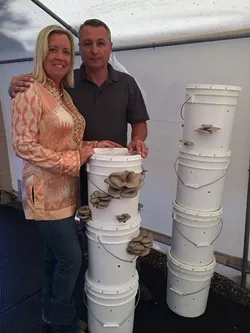 FUNGAL COUPLE: Jiri Pravec and his wife, Lisa, grow with robust oyster mushrooms on their Edna Valley farm. Pravec’s labor of love, Arboreal Bounty Fine Gourmet Mushrooms, is ready to ramp into full production before summer’s end. - PHOTO COURTESY OF JIRI PRAVEC