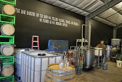 BOOZE TOWN : With the demand for craft spirits continuing to grow in the county, Wine Shine is currently working on getting a bigger still so they can increase production of their spirits. - PHOTO BY DYLAN HONEA-BAUMANN