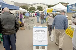 IT WAS A COLD AND STORMY DAY : The Farmers’ Market in Morro Bay is upping the ante with a food court that provides delicious ready-to-eat wares. - PHOTO BY STEVE E. MILLER