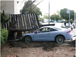 NOT A SCHEDULED STOP : This vehicle slipped from its restraints on a flat-bed truck and careened into a bus stop, causing roughly $5,000 in damages. - PHOTO COURTESY OF SAN LUIS OBISPO POLICE DEPARTMENT