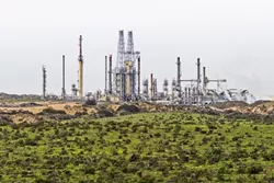 RAIL SPUR RUCKUS: Members of the Mesa Refinery Watch Group are urging city council members like those in Pismo Beach to oppose plans for a rail spur project proposed by the Phillips 66 oil company. - FILE PHOTO BY KAORI FUNAHASHI