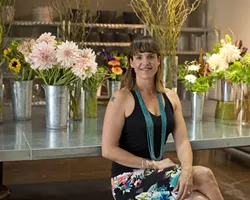 EVERYONE LOVES FLOWERS: Clover and Branch owner Carrie Skelton plays host to a flower fest every Friday in her floral studio, with fresh flower arrangements that’ll look great anywhere you put them. - PHOTO BY STEVE E. MILLER