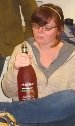 SILLY JUICE : Arbor Mist’s pink wine is probably the most childish alcoholic beverage on Earth. Captain Schwellenbach swigged from the bottle to loosen up for a round of hide and seek. - PHOTO BY NICK POWELL