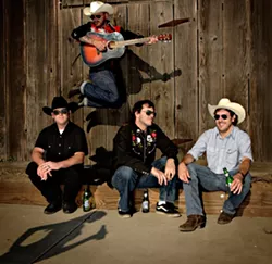 YEE-HAW! : The Benevolent Dr. Reid Cain (airborne) and his band Red Eye Junction play an album release party in Downtown Brew on Jan. 3. - PHOTO BY STEVE E. MILLER