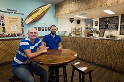 CARRYING ON THE LEGACY:  Mattia Tedeschi and Filippo Giordano are lifelong friends who grew up in Italy and relocated to the Central Coast in March 2014 in search of their slice of the American Dream. Together, they aim to keep the 25-year-old Kona&rsquo;s Deli tradition alive while adding a few upgrades to the ingredients and delivery service. - PHOTO BY KAORI FUNAHASHI