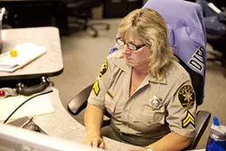 VETERAN : Senior Dispatcher Kelly Fontes has been on the job for 15 years. - PHOTO BY STEVE E. MILLER