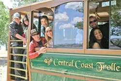 ALL ABOARD! :  (Left to right) David, Tamara (the birthday girl!), Chad, Dan, Rakesha, Chris, and Patty are among the dozens of us who rode the Central Coast Trolley to four Paso Robles wineries. - PHOTO BY GLEN STARKEY