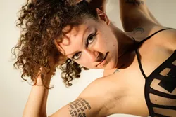 CAN I BORROW SOME ELECTRICAL TAPE? : Not to be confused with stripping, burlesque dancers keep their butts and boobs (or at least nipples) covered.