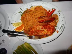 GLOBE-TROTTING FOR FOODIES : Trattoria Gargani's spaghetti with spicy garlic marinara and lobster and grilled veal chop with arugula and tomatoes was one of the highs amongst a surprisingly varied tour of Europe. - PHOTOS BY DAN HARDESTY